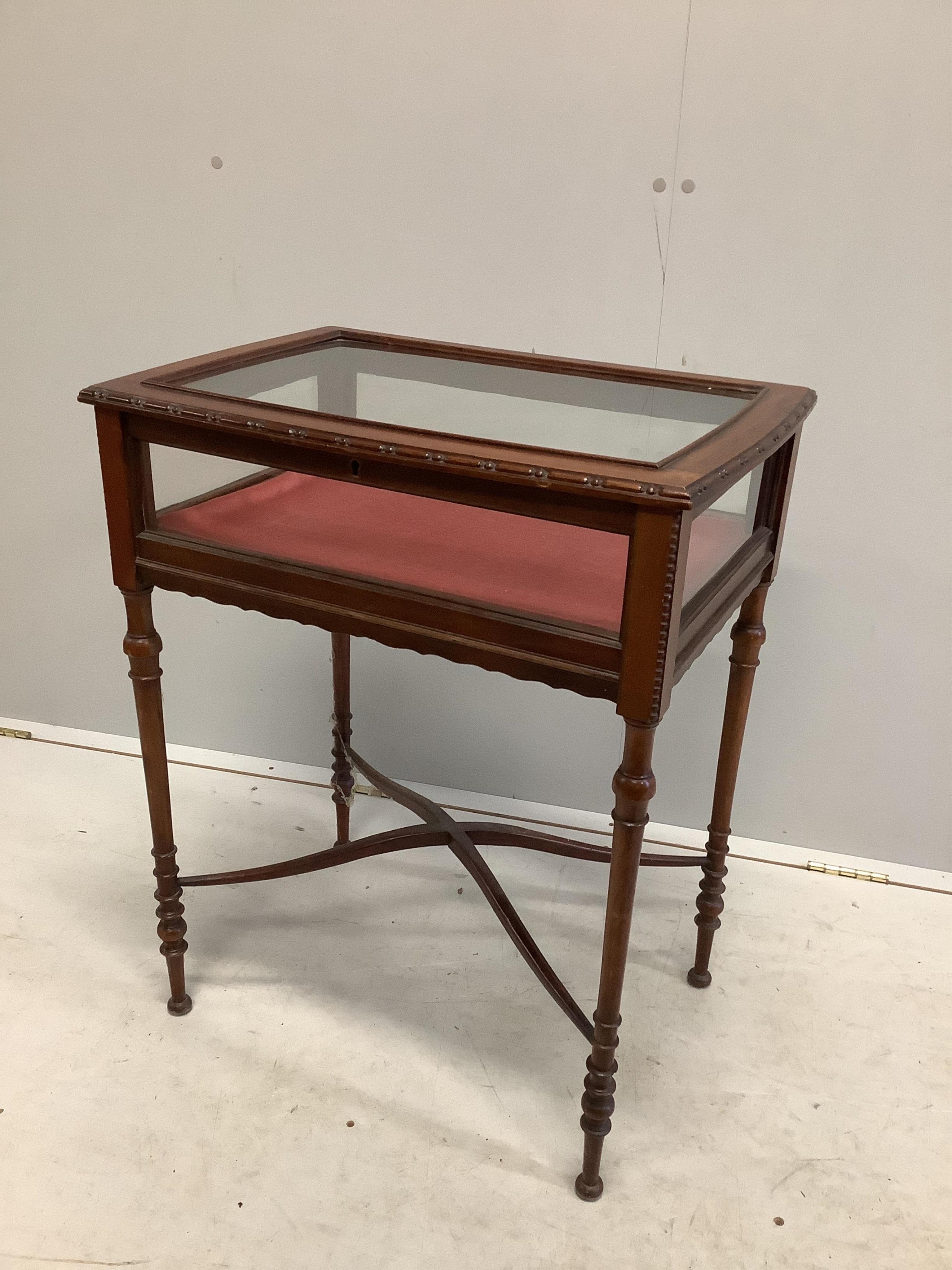 An early 20th century mahogany bijouterie table, width 60cm, depth 42cm, height 73cm. Condition - fair